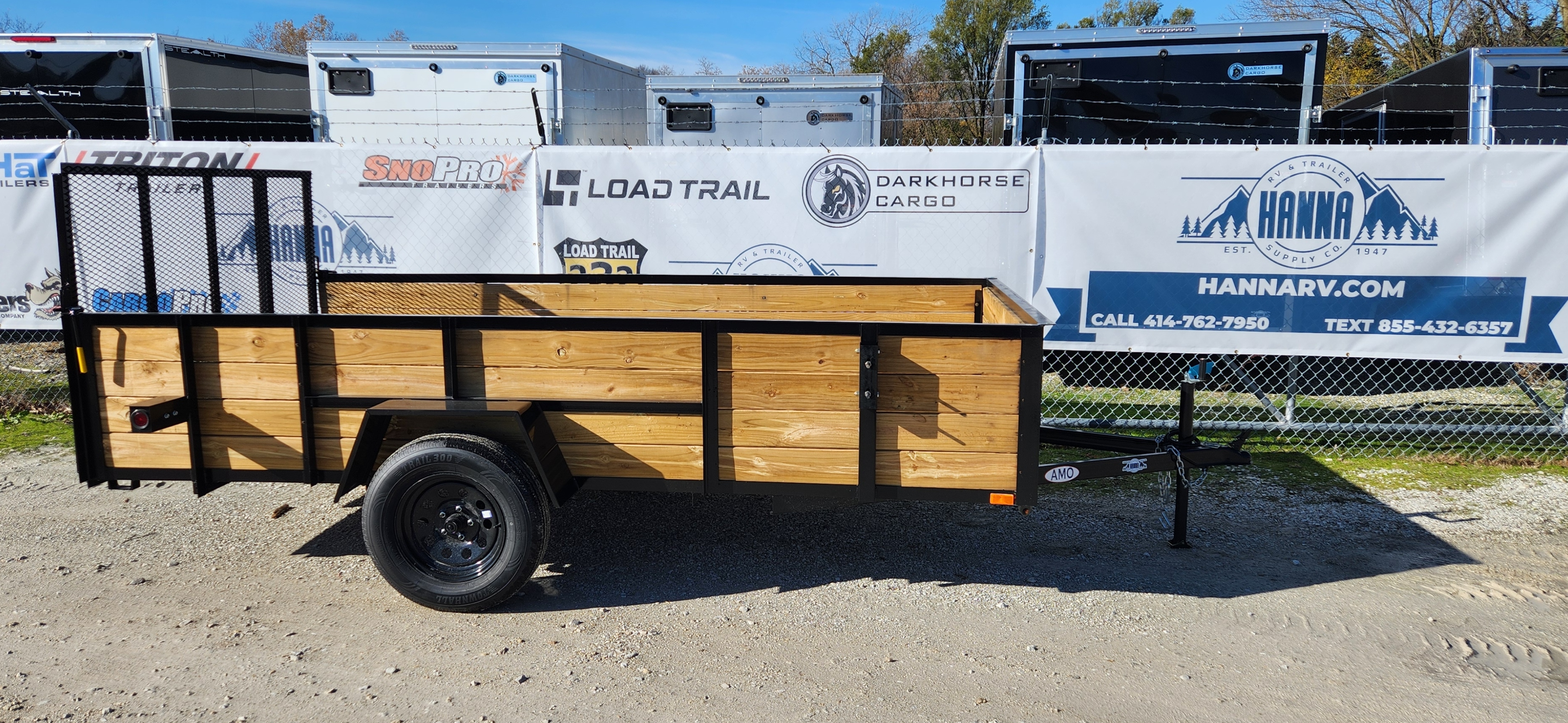 AMO 76 X 12 Steel Utility Trailer with Ramp Gate and 24" High Solid Wood Sides